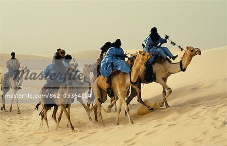 The Festival in the Desert 2005. Touregs arriving by camel to the festival