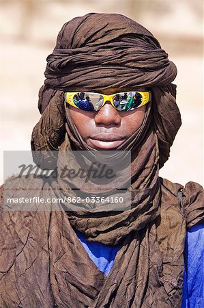 CANADA, TORONTO, 24.04.2011, A Sikh man with mirrored glasses and a Sikh  emblem on his turban..., Stock Photo, Picture And Rights Managed Image.  Pic. VIG-2609239 | agefotostock