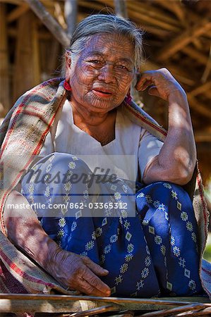 Myanmar,Chin State,Kyi Chaung Village. A Chin woman with tattooed face. It was customary in the past for girls to be tattooed at 14 or 15 years old,a painful process which took two days.