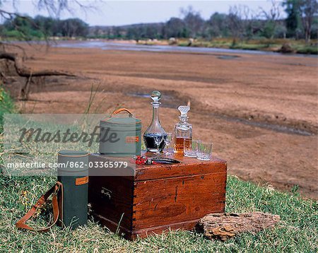 Cocktails beside the Ewaso Nyiro River on a mobile safari.