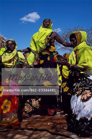 Gabbra women dance at a gathering in the village of Kalacha. The Gabbra are a Cushitic tribe of nomadic pastoralists living with their herds of camels and goats around the fringe of the Chalbi Desert.