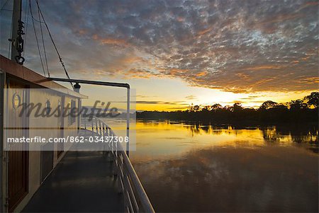 Peru,Amazon River. Sunrise on the Ayapua Riverboat,Yavari River,a tributary of the Amazon River.