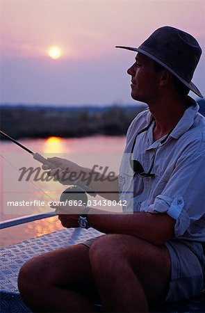 Zambia,Lower Zambezi National Park. Fly-fishing for tiger fish on the Zambezi River.