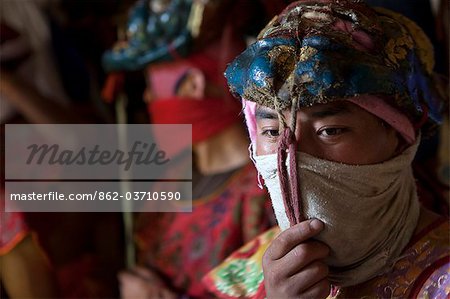 Participants and spectators prepare for the Tsechu at Thangbi Mani monastery in Bhutan. Tsechu (literally 'day ten') are annual religious Bhutanese festivals