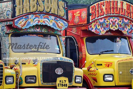 India, South India, Kerala. Painted trucks parked in Cochin.