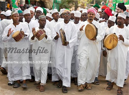 Kenya. A joyful Muslim procession during Maulidi, the celebration of Prophet Mohammed s birthday.