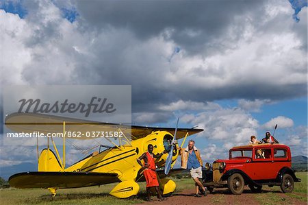 Kenya, Laikipia, Lewa Downs. Will Craig's 1930s style Waco Classic open cockpit bi-plane for the ultimate aerial safari.