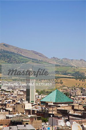 The roof of the Qarawiyine Mosque rises above the medina of Fes, Morocco