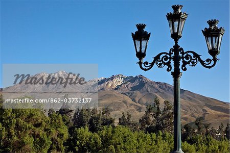 Peru, The extinct volcano, Chachani dominates the Arequipa skyline. Many buildings are built with sillar, stone mined from this volcano.