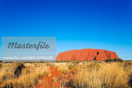 Australia, Northern Territory, Uluru-Kata Tjuta National Park.   Uluru (Ayers Rock) at sunset.  (PR)