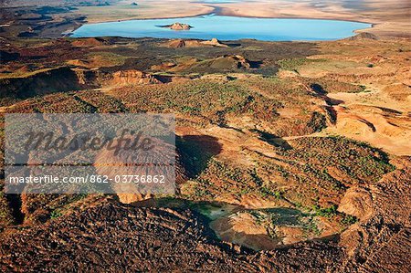 Volcanic craters and lava dotting the volcanic ridge, known as The Barrier, that divided Lake Turkana and the Suguta Valley.