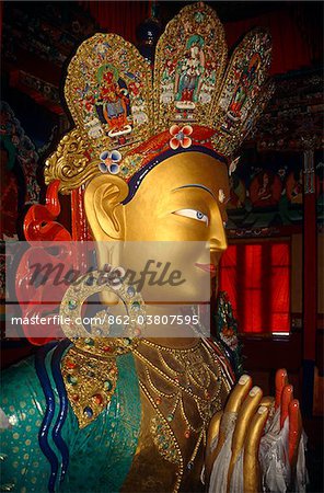 India, Jammu & Kashmir, Ladakh, Tikse. Inaugurated by the Dalai Lama in 1980, the main prayer hall of Tikse Gompa, or Monastery, is dominated by a huge 14-metre tall gold-faced statue of the Maitreya, or Future Buddha.