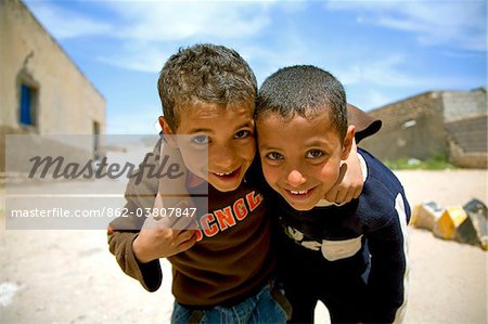 Tripoli, Libya; Two Libyan children posing for the camera at one of the old quarters of the Old Medina