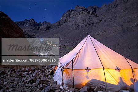 Morocco, Mount Toubkhal, base camp for the climb up to North Africas highest peak bathed under the light of a full moon