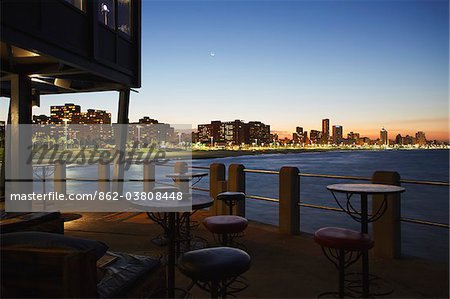 View of city skyline from Moyo restaurant on Addington Beach pier, Durban, KwaZulu-Natal, South Africa