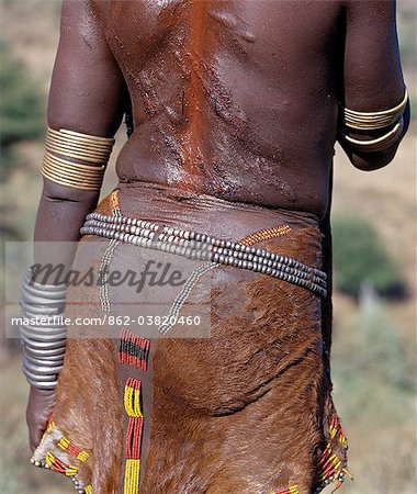 Hamer woman´s back after being whipped at a bull jumping ceremony