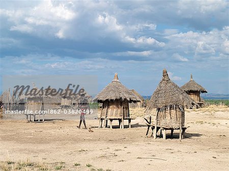 A Karo homestead close the Omo River. The small thatched huts built off the ground are food stores.The Karo are a small tribe living in three main villages along the lower reaches of the Omo River in southwest Ethiopia.