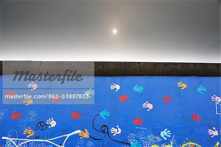 Remaining stretch of the Berlin Wall called East Side Gallery. Berlin, Germany
