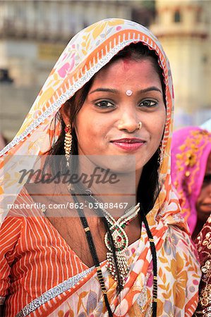 The bridesmaid in a marriage on the banks of the Ganges river. Varanasi, India