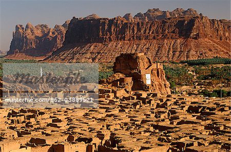 Saudi Arabia, Madinah, Al-Ula. The small yet striking castle of Musa Abdul Nasser rises in the midst of the crumbling mud-brick houses of Old Al-Ula, an oasis occupying the site of an ancient city called Dedan.