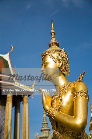 Thailand, Bangkok.  A Kinora (mythical half man half bird creature) at Wat Phra Kaew (Temple of the Emerald Buddha).