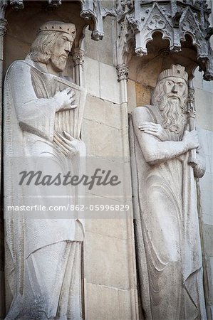 Carvings on the facade of City Hall in Bourg square, one of the best places to see about medieval Bruges, Flanders, Belgium