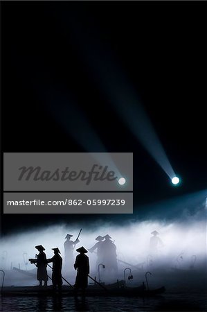 China, Guangxi Province, Yangshuo. Evening Light Show on the Li River.