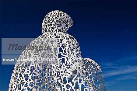 La Fontonne, Antibes, Provence Alpes Cote d'Azur, France. The Nomad sculpture by the artist Jaume Plensa on the Walls of Saint Jaume Bastion