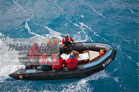 A Zodiac inflatable boat leaving the expedition ship Ocean Nova for Right Whale Bay near the northeast tip of South Georgia