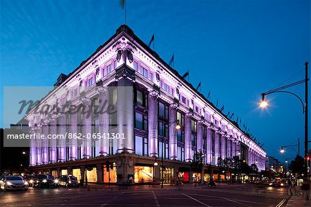 The famous Selfridges Department Store on Oxford Street in London at dusk.