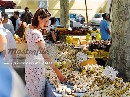 France, Provence, Arles, Woman at foodmarket MR