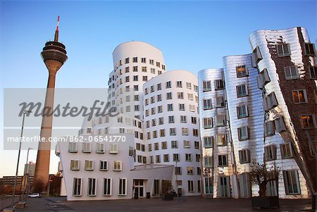 Dusseldorf, North Rhine Westphalia, Germany, The Neuer Zollhof buildings with the Rheinturm Tower in the background