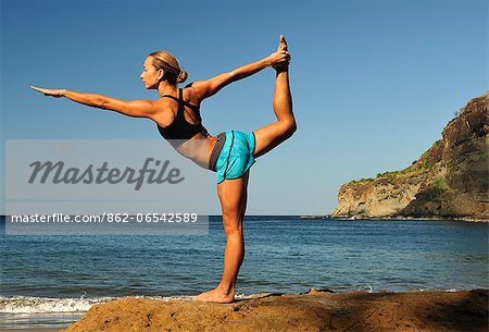 Woman in yoga pose at the Aqua Wellness Resort, Nicaragua, Central America Woman in yoga pose at the Aqua Wellness Resort, Nicaragua, Central America