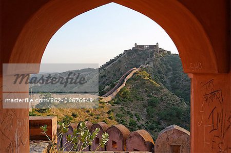 India, Rajasthan, Jaipur, Amber. Viewed from a watchtower on the long crenellated walls surrounding Amber Fort, the lofty walls of the Charbagh gardens in neighbouring Jaigarh Fort top a barren ridge.