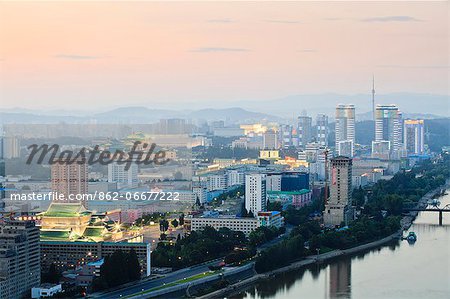 Democratic Peoples Republic of Korea. North Korea, Pyongyang. Elevated view of the city at dusk.