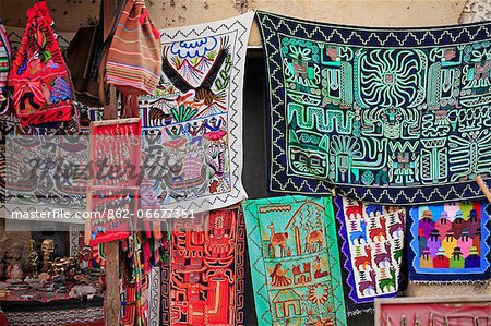 South America, Peru, Cusco, Sacred Valley, Ollantaytambo. A tourist shop selling woolen clothing ibased on Andean and Shipibo designs