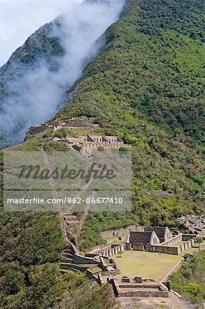 South America, Peru, Cusco, Choquequirao. Terraces, plazas and buildings at the Inca city of Choquequirao built by Tupac Inca Yupanqui and Huayna Capac and situated above the Apurimac valley with mountains of the Salkantay range