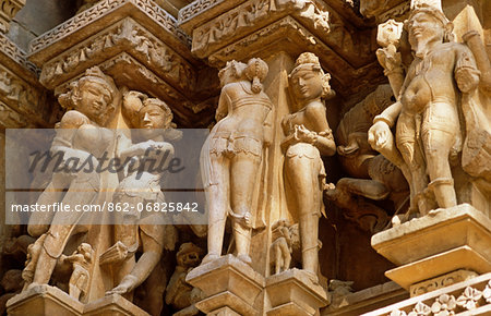 Asia, India, Madhya Pradesh, Khajuraho. Adinath temple. Detail of the celestrial maidens carved in stone on the exterior. Asia, India, Madhya Pradesh, Khajuraho. Adinath temple. Detail of the celestrial maidens carved in stone on the exterior.