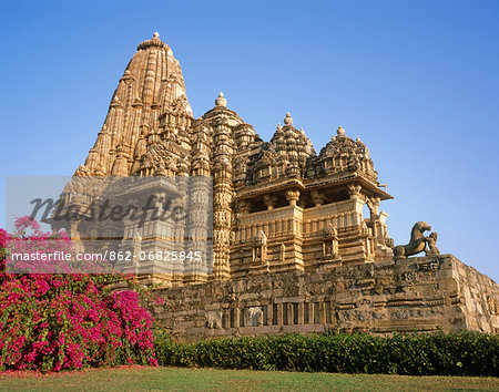 Asia, India, Madhya Pradesh, Khajuraho. Kandariya Mahadev Temple, western group. Lion and figure fighting. Asia, India, Madhya Pradesh, Khajuraho. Kandariya Mahadev Temple, western group. Lion and figure fighting.