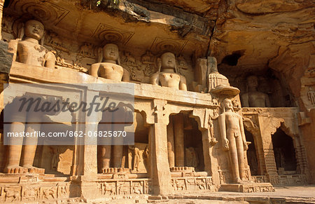 Asia, India, Madhya Pradesh, Gwalior. Jain sculptures carved into the side of the rock on the ascent to the fort.