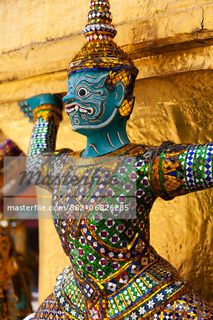 Thailand, Bangkok. Statue at Wat Phra Kaeo, Temple of the Emerald Buddha, within the grounds of the Royal Grand Palace. Thailand, Bangkok. Statue at Wat Phra Kaeo, Temple of the Emerald Buddha, within the grounds of the Royal Grand Palace.