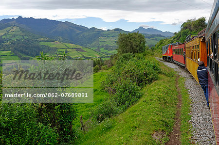 Ecuador, Pichincha. Ecuador's 'Tren Crucero', or Cruise Train, heads south of Quito through a lush landscape nicknamed the Avenue of Volcanoes by Prussian explorer Alexander von Humboldt in the early 1800s.