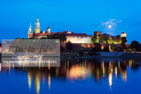 Europe, Poland, Malopolska, Krakow, full moon over Wawel Hill Castle and Cathedral, Vistula River, Unesco site