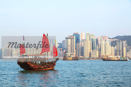 Hong Kong, China. Traditional chinese junk sail in Victoria harbour Hong Kong, China. Traditional chinese junk sail in Victoria harbour