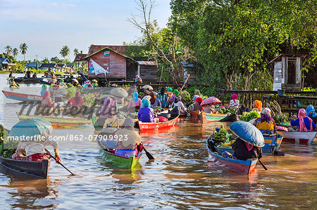 Indonesia, South Kalimatan, Lok Baintan. A picturesque floating market scene on the Barito River.