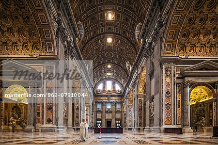 The south transept of St. Peter's Basilica containing the altars of Saint Thomas, Saint Joseph and the Crucifixion of Saint Peter, Vatican City, The Vatican, Rome, Lazio, Italy. The south transept of St. Peter's Basilica containing the altars of Saint Thomas, Saint Joseph and the Crucifixion of Saint Peter, Vatican City, The Vatican, Rome, Lazio, Italy.