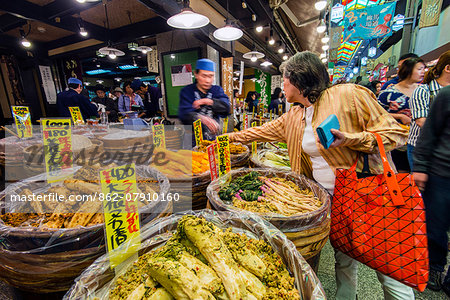 Fresh food stall inside Nishiki food market, Kyoto, Japan