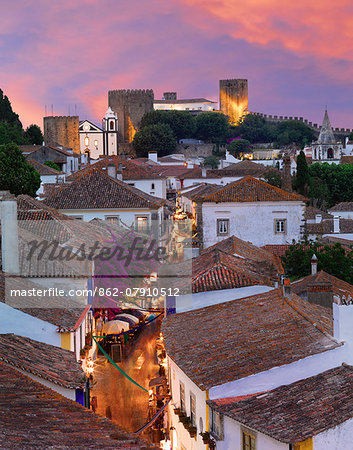 Portugal, Estramadura,Obidos, overview of 12th century town at dusk