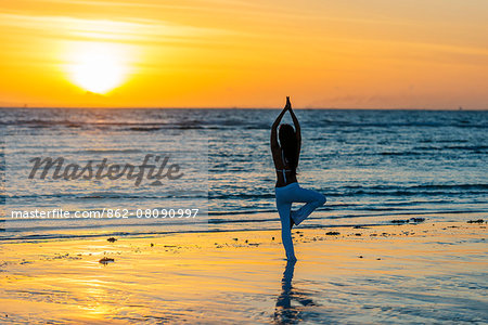 South East Asia, Philippines, The Visayas, Cebu, Bantayan Island, Sugar Beach, girl doing yoga (MR)