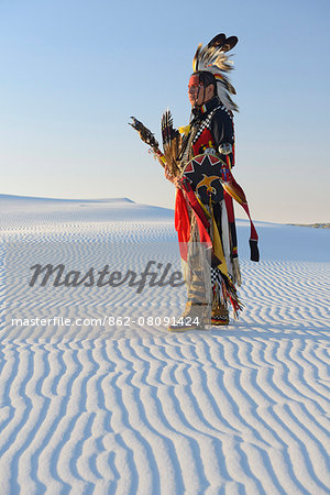 Native American in full regalia, White Sands National Monument, New Mexico, USA MR